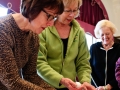 Lina Geiresbach and Mary Eagan select eggs to decorate during the Castle Museum's Lunch and Learn program on March 5, 2013. Participants learned the art of Krasclice.